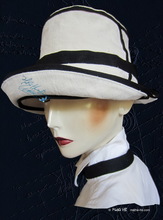 summer hat, white sand and night blue linen